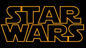 Star Wars logo - gold on black, stars in background