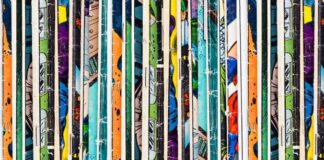 How To Host a Local Comic Book Collectors’ Convention A close-up of various comic books standing upright to see only their spines and small portions of their covers.